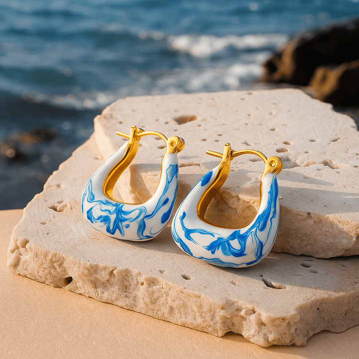 Aretes de Pluma de Oro Helene: Elegancia y Estilo que Resaltan tu Belleza