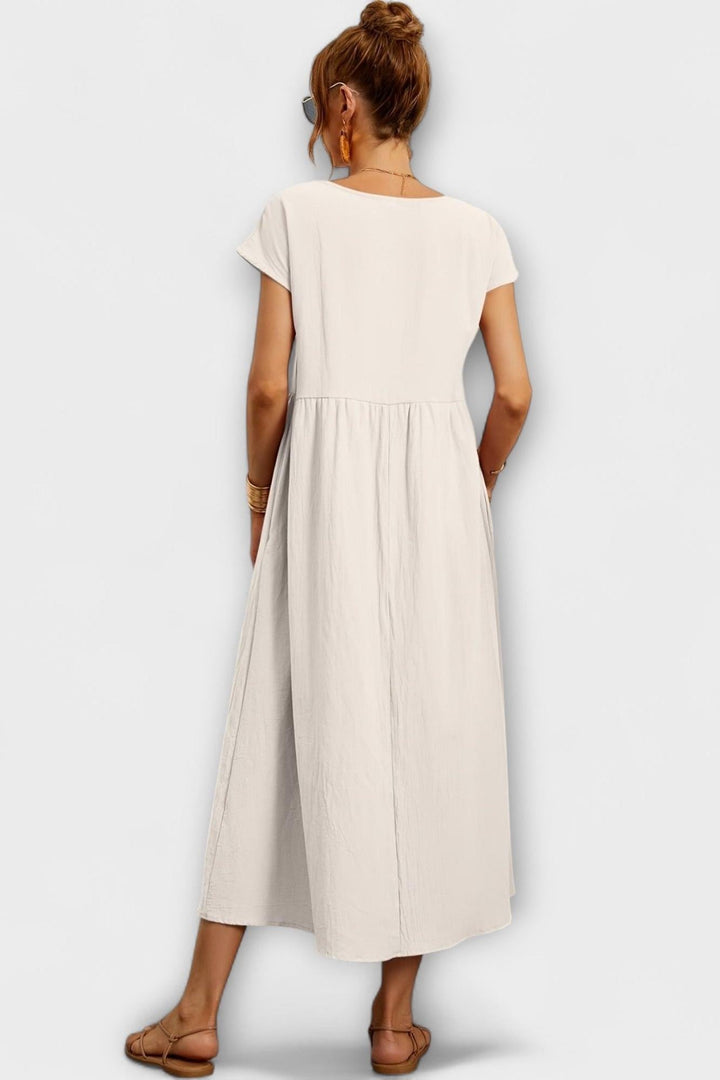 "Pernille | Vestido con bolsillos laterales" can be rewritten as "Pernille | Vestido con bolsillos laterales elegantes".