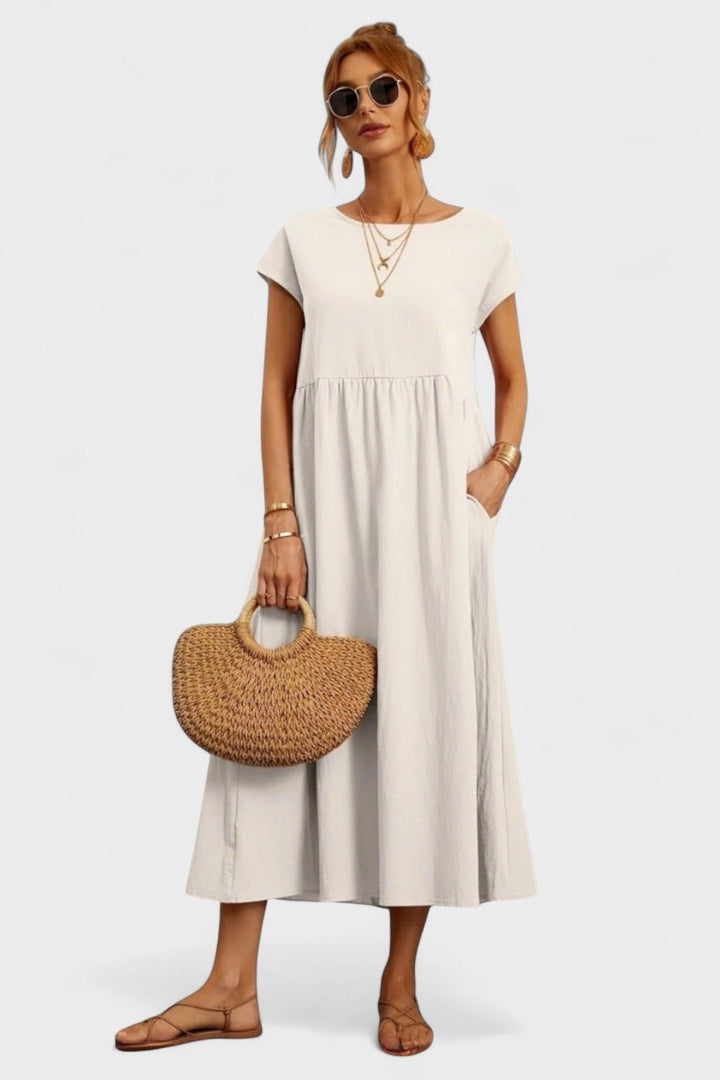 "Pernille | Vestido con bolsillos laterales" can be rewritten as "Pernille | Vestido con bolsillos laterales elegantes".